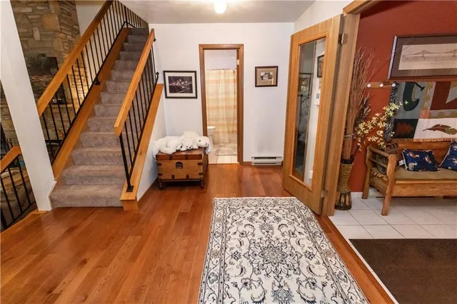 a view of a livingroom with furniture and a fireplace