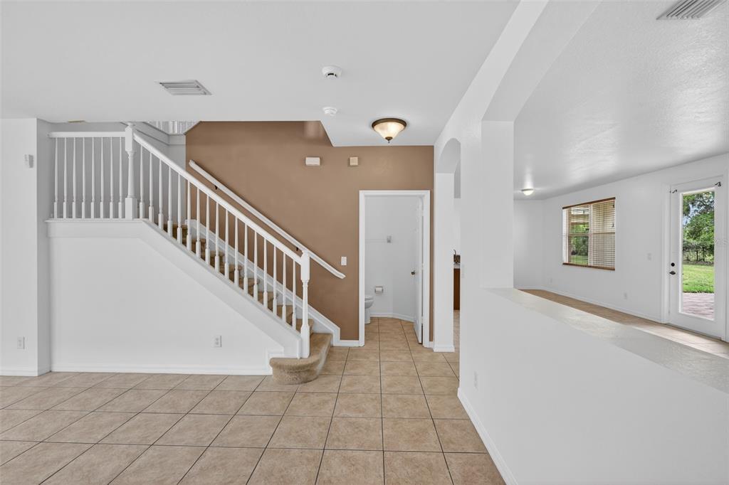 4197 River Bank Way Punta Gorda, FL 33980 - Photo 19 of 73 a view of a hallway with staircase