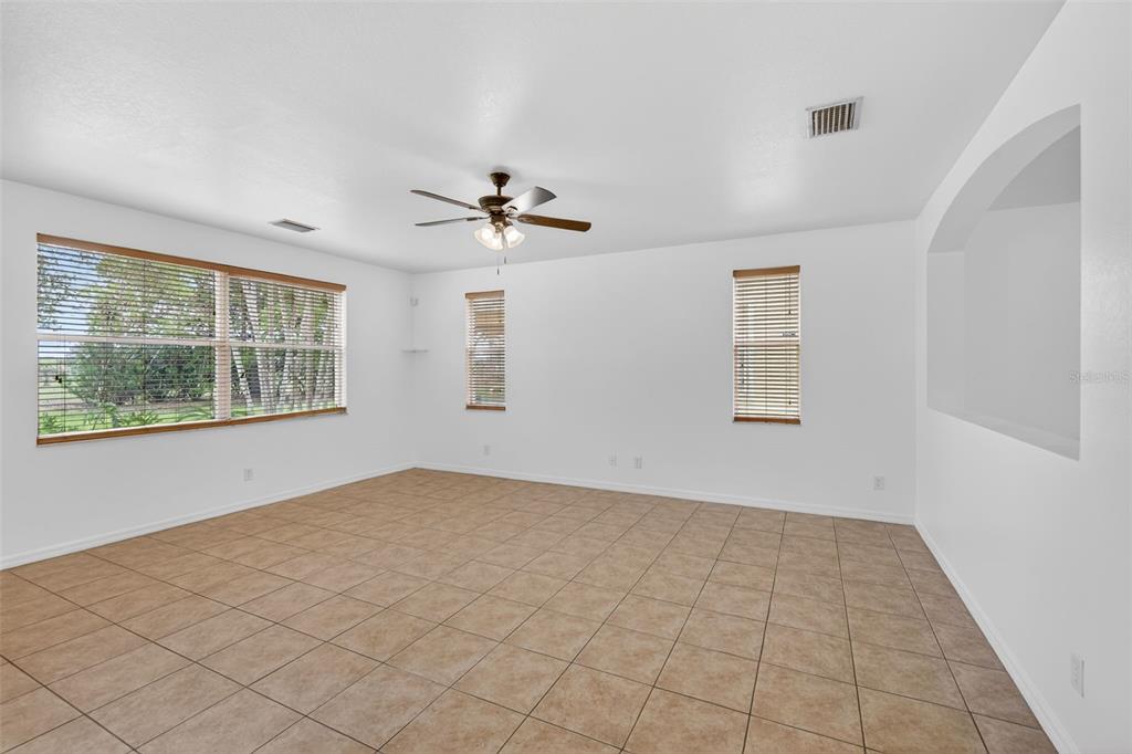 4197 River Bank Way Punta Gorda, FL 33980 - Photo 23 of 73 a view of an empty room with windows