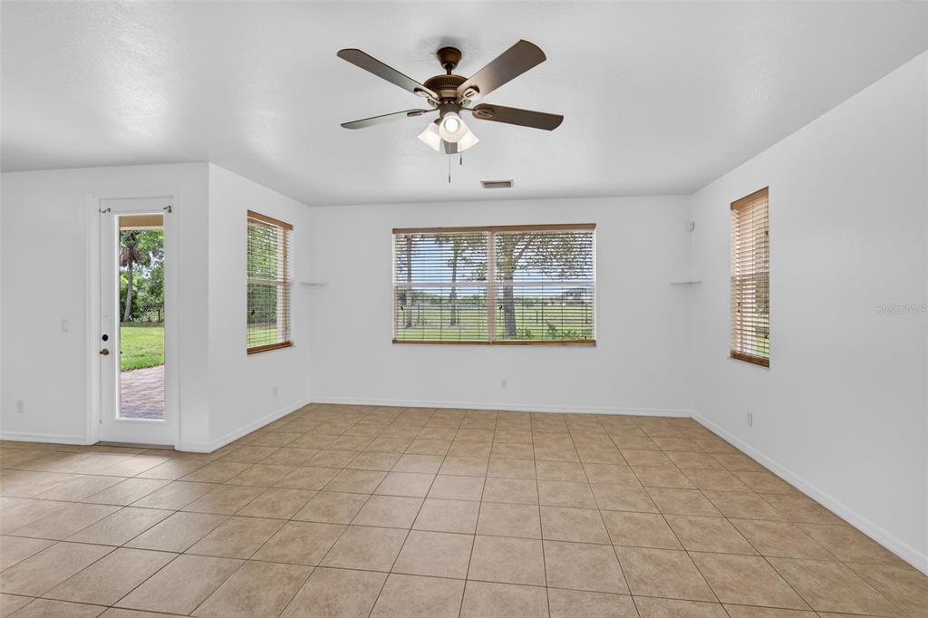 4197 River Bank Way Punta Gorda, FL 33980 - Photo 24 of 73 a view of an empty room with a window