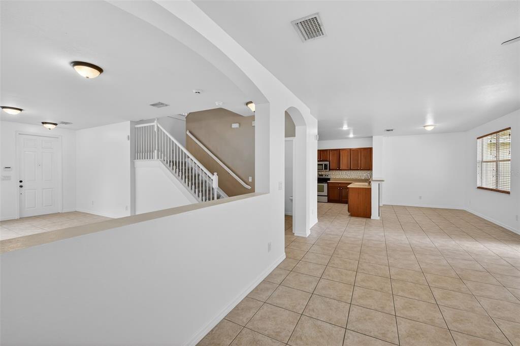 4197 River Bank Way Punta Gorda, FL 33980 - Photo 26 of 73 a view of a kitchen with furniture and an empty room