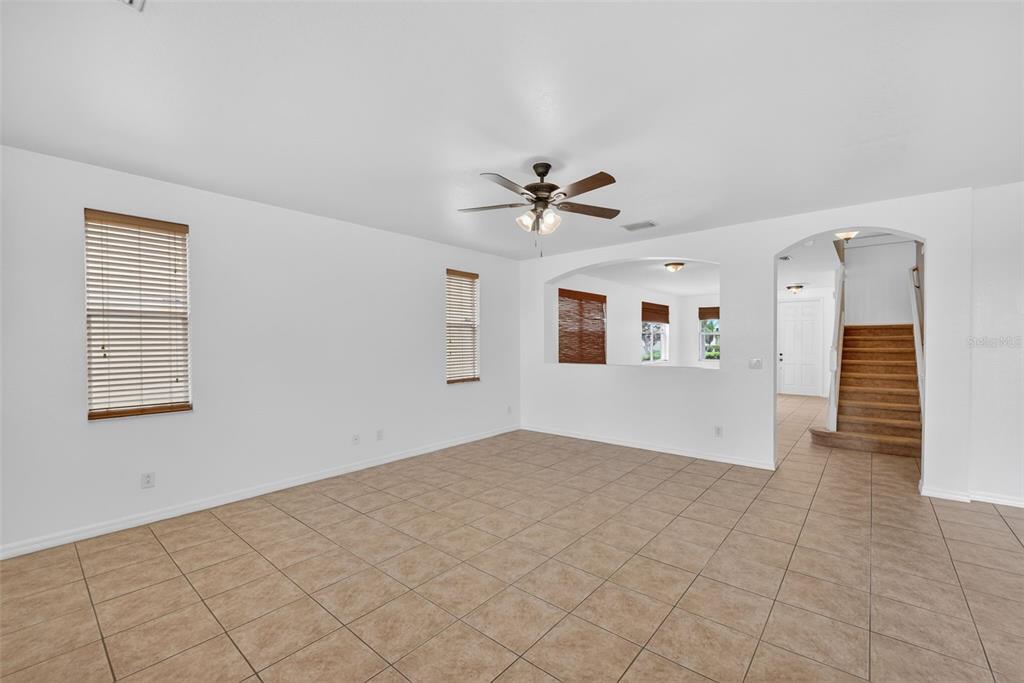4197 River Bank Way Punta Gorda, FL 33980 - Photo 28 of 73 a view of empty room with wooden floor and ceiling fan