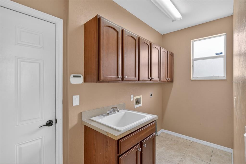 4197 River Bank Way Punta Gorda, FL 33980 - Photo 30 of 73 a bathroom with a sink a vanity and a mirror