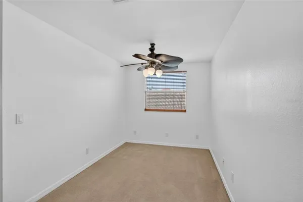a spacious bathroom with a bathtub and a sink