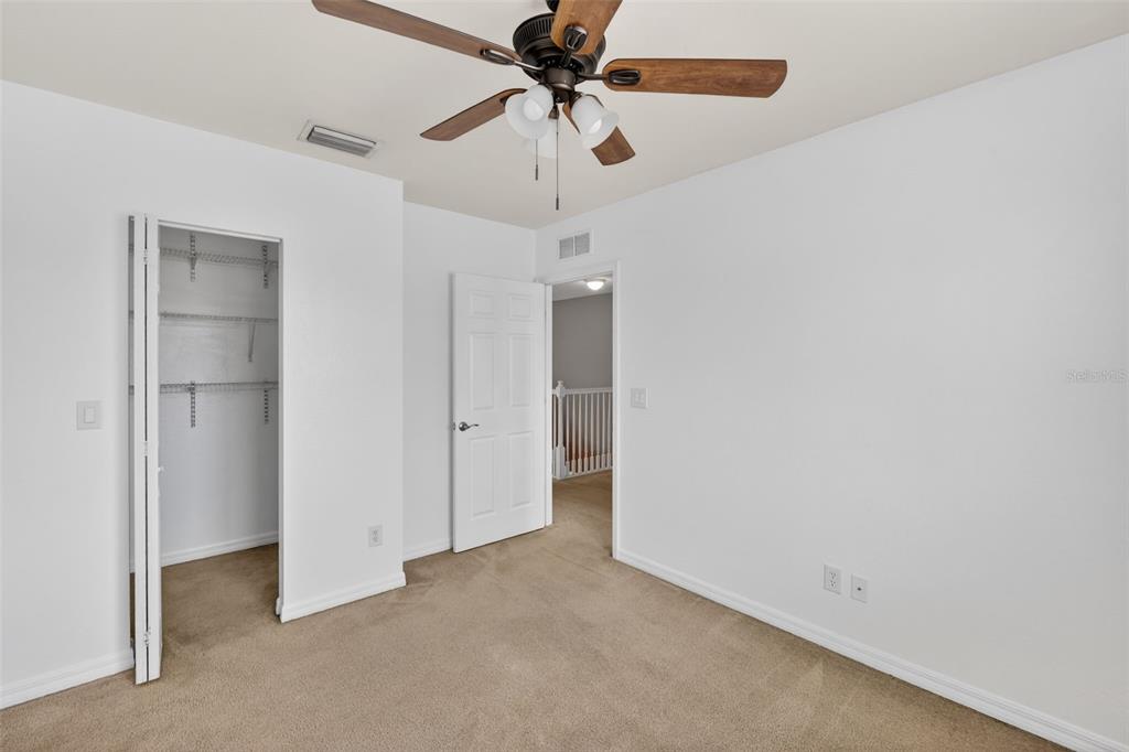 4197 River Bank Way Punta Gorda, FL 33980 - Photo 35 of 73 a view of a chandelier fan in a room