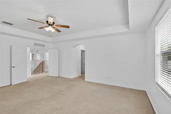 a view of swimming pool with outdoor seating and plants