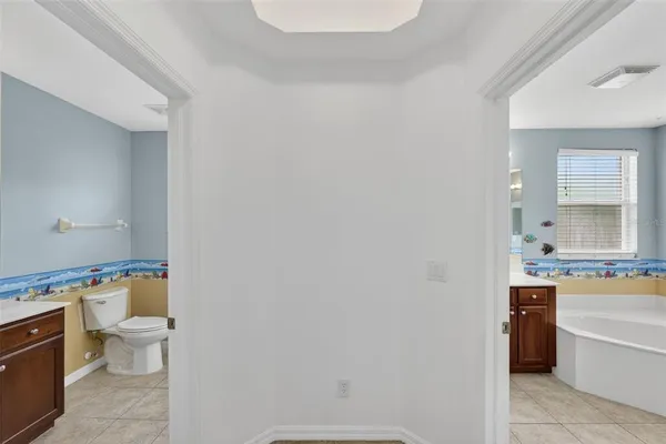 a view of a house with swimming pool and a yard