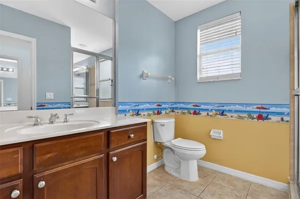 a couple of cars parked in front of a building