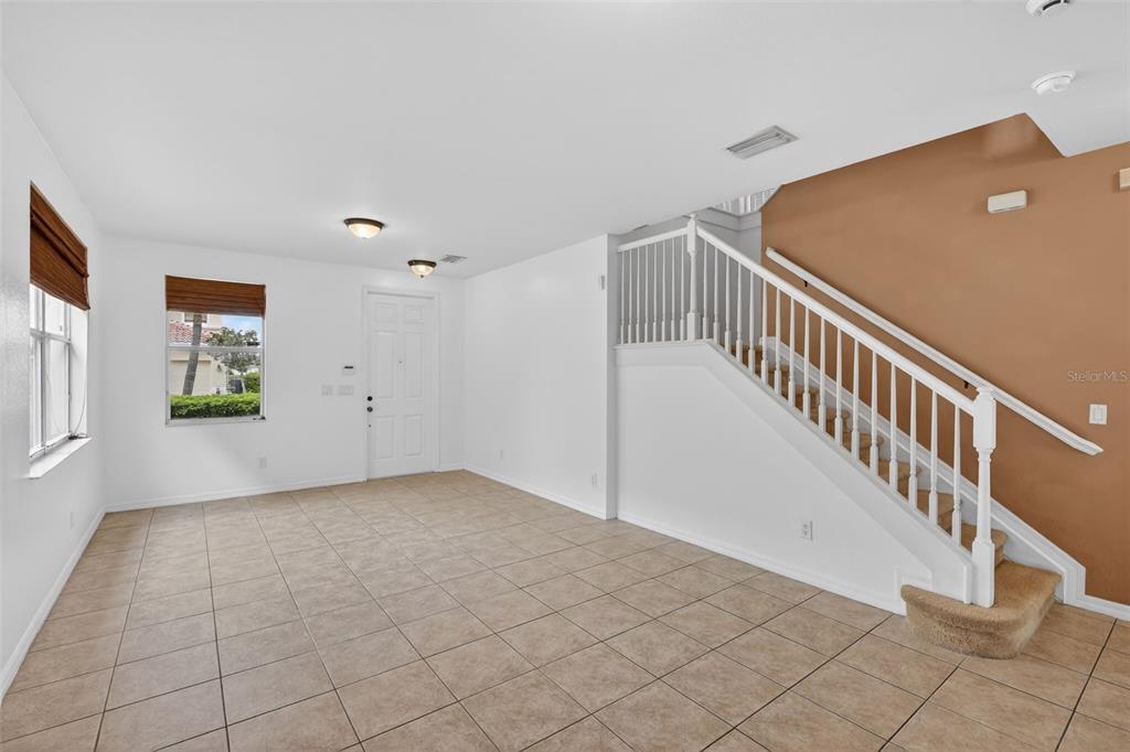 4197 River Bank Way Punta Gorda, FL 33980 - Photo 5 of 73 a view of an entryway with wooden floor