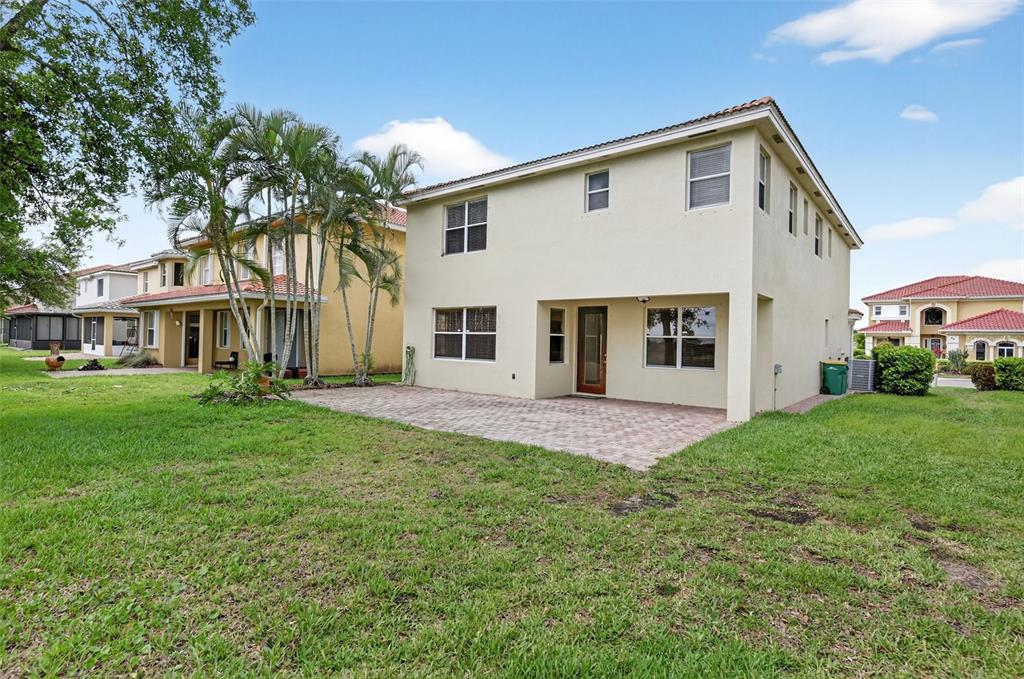 4197 River Bank Way Punta Gorda, FL 33980 - Photo 56 of 73 a front view of a house with a garden