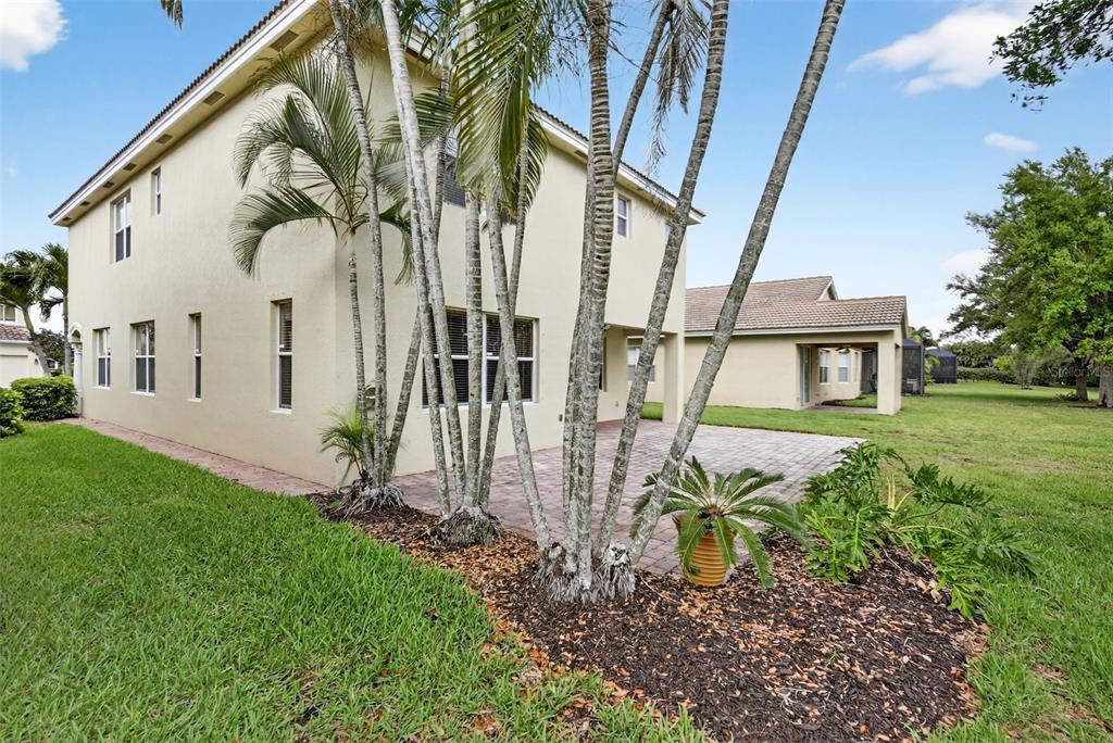 4197 River Bank Way Punta Gorda, FL 33980 - Photo 60 of 73 a backyard of a house with lots of green space