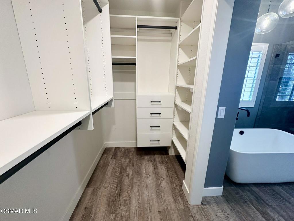111 Macademia Lane Simi Valley, CA 93065 - Photo 24 of 38 a view of walk in closet with clothes and shoes