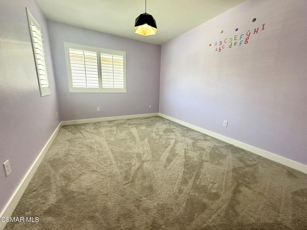 111 Macademia Lane Simi Valley, CA 93065 - Photo 31 of 38 a view of an empty room with a window