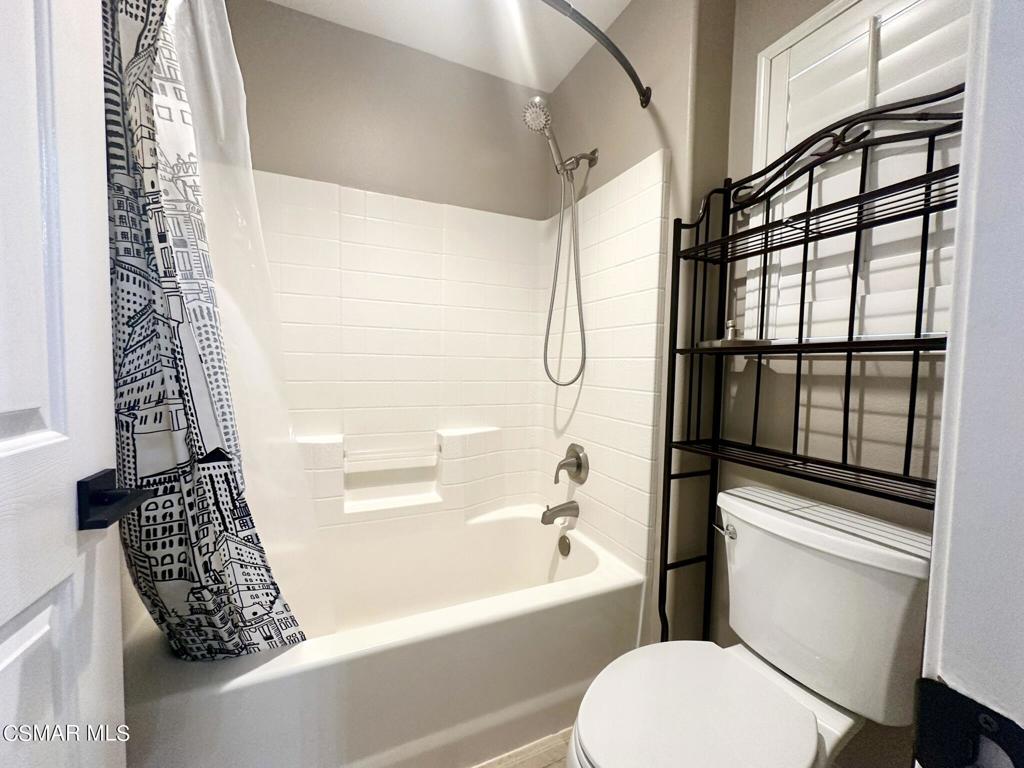 111 Macademia Lane Simi Valley, CA 93065 - Photo 33 of 38 a bathroom with a toilet and a shower
