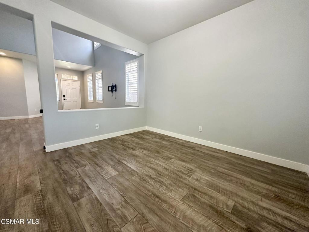 111 Macademia Lane Simi Valley, CA 93065 - Photo 6 of 38 a view of empty room with wooden floor