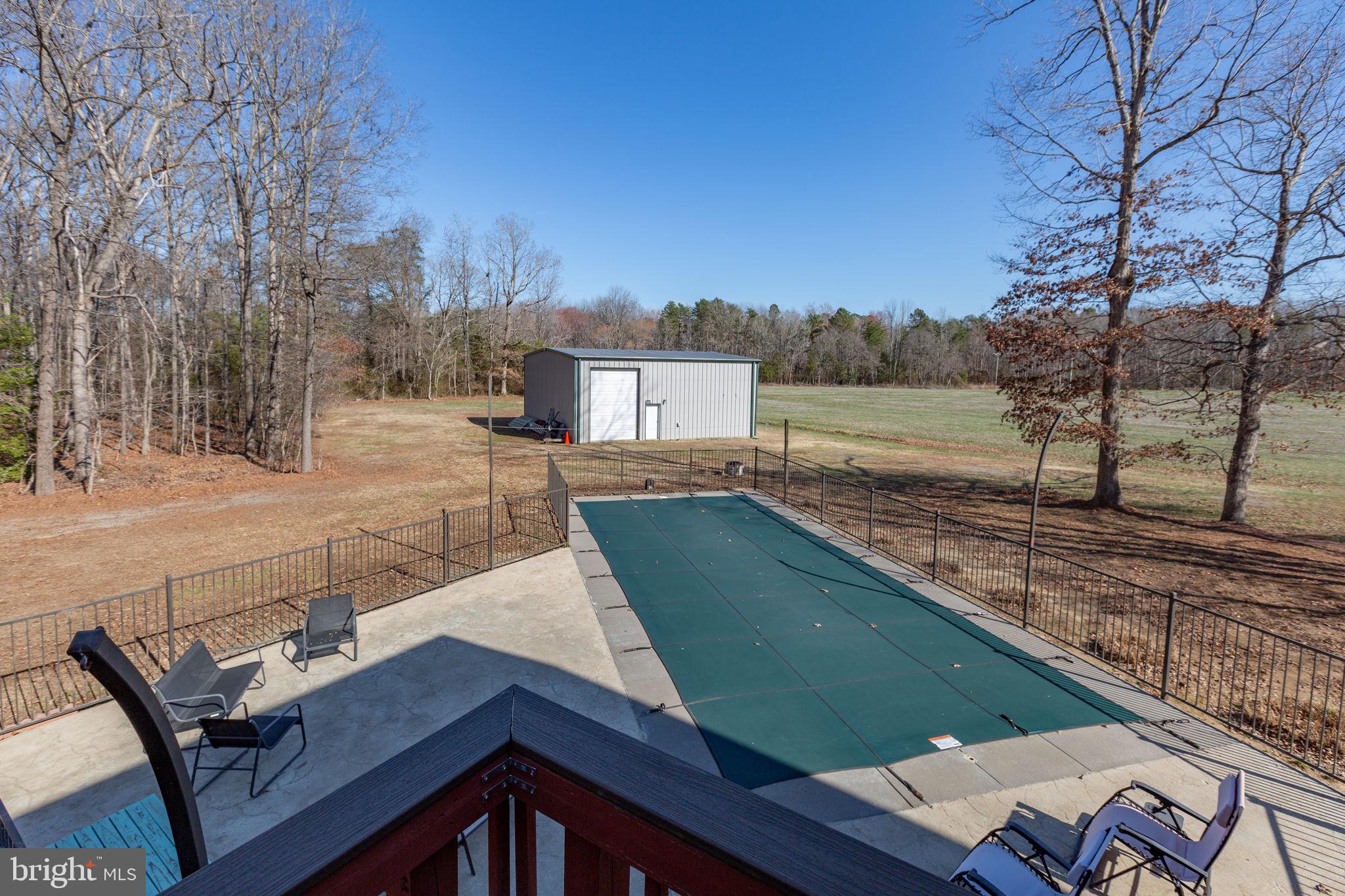 5825 Morris Road Spotsylvania, VA 22551 - Photo 66 of 120 Back deck overlooking the inground pool