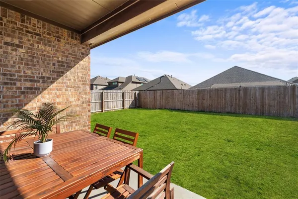 a view of a backyard with a garden