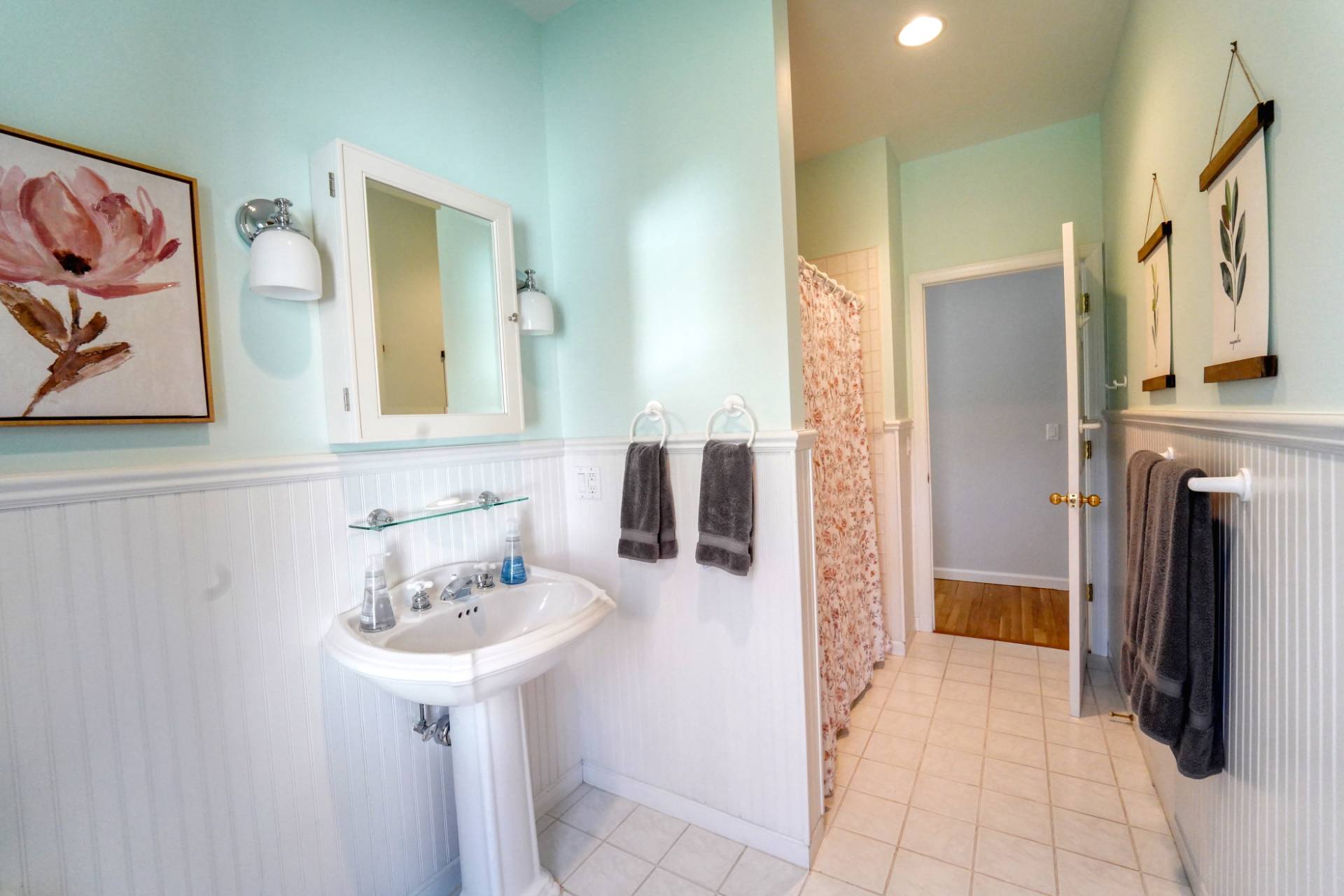 7 Plume Grass Way Westhampton, NY 11977 - Photo 20 of 23 a bathroom with a sink and a mirror