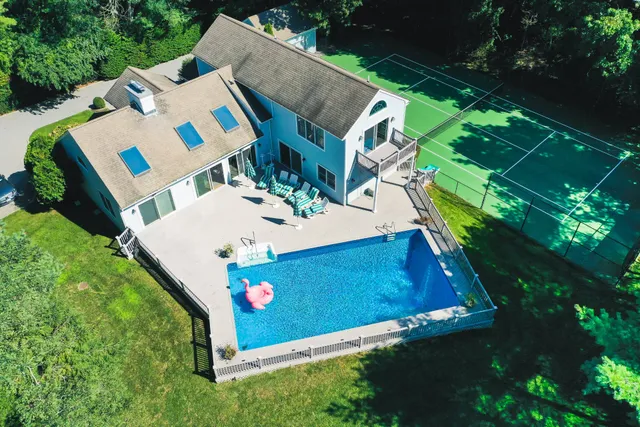 an aerial view of a house roof deck