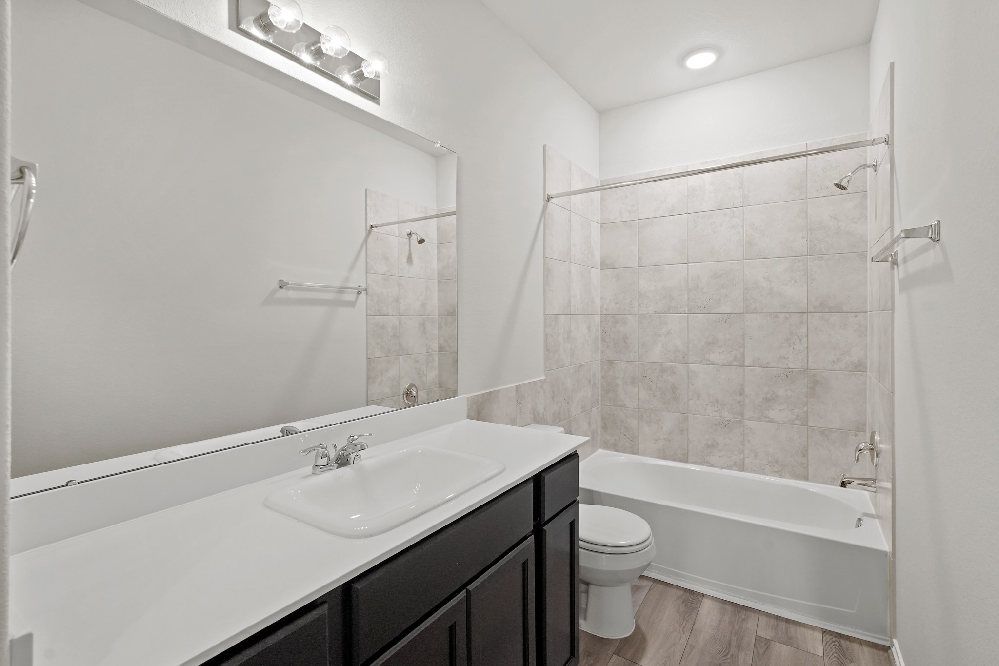 1407 Acorn Meadow Street Houston, TX 77067 - Photo 17 of 22 a bathroom with a sink a toilet and shower