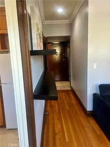 a view of a living room with a large window