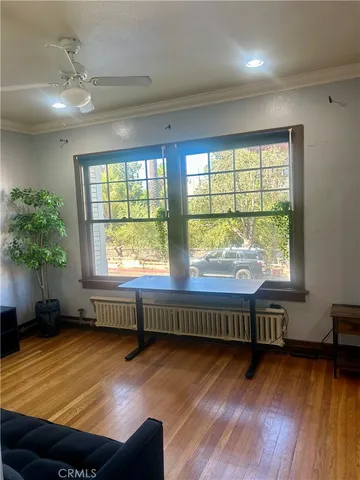 a living room with wooden floor