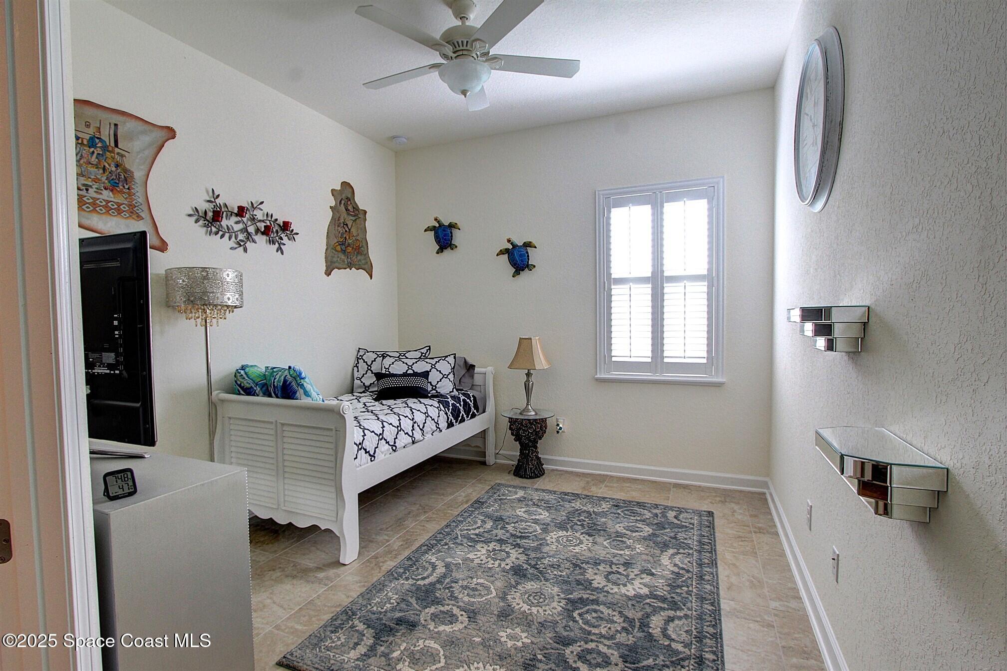 2542 Chapel Bridge Lane Melbourne, FL 32940 - Photo 29 of 44 a living room with furniture and wooden floor