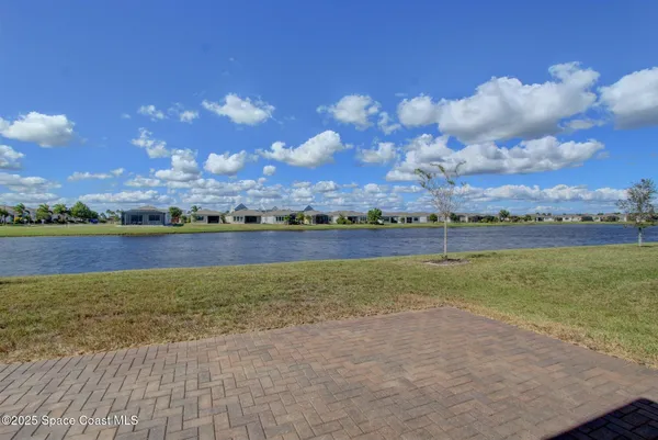 a view of a lake with a big yard