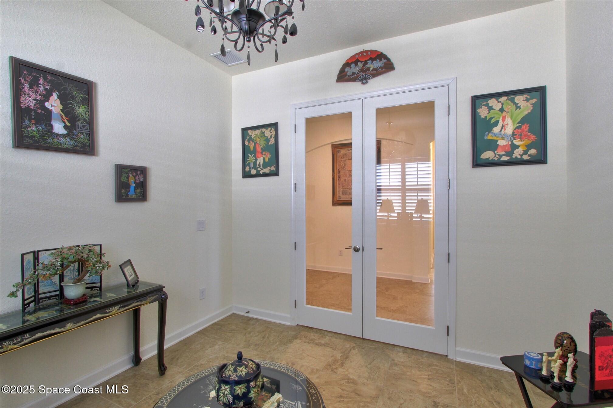 2542 Chapel Bridge Lane Melbourne, FL 32940 - Photo 9 of 44 a view of a livingroom with a camera