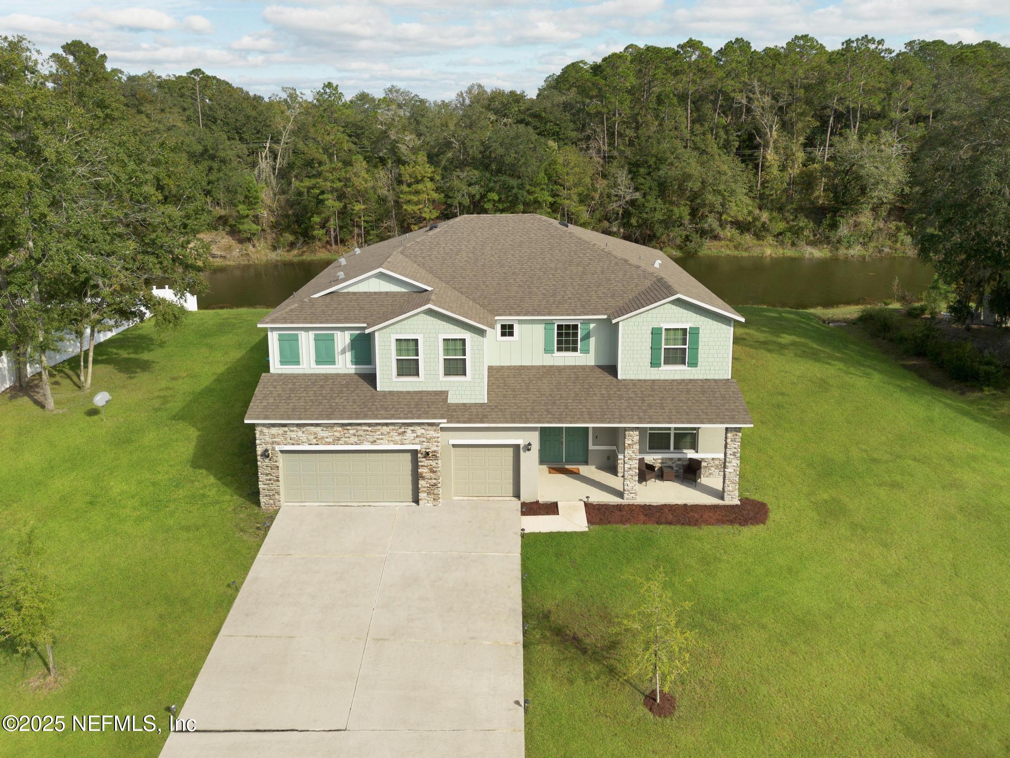 1465 Lake Foxmeadow Road Middleburg, FL 32068 - Photo 2 of 45 an aerial view of a house