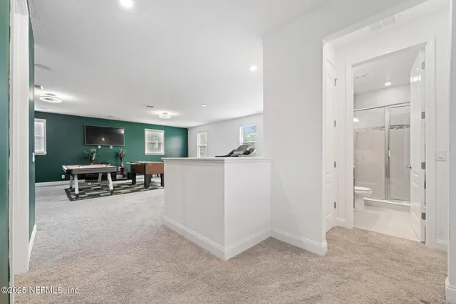 a view of a livingroom with furniture and a couch