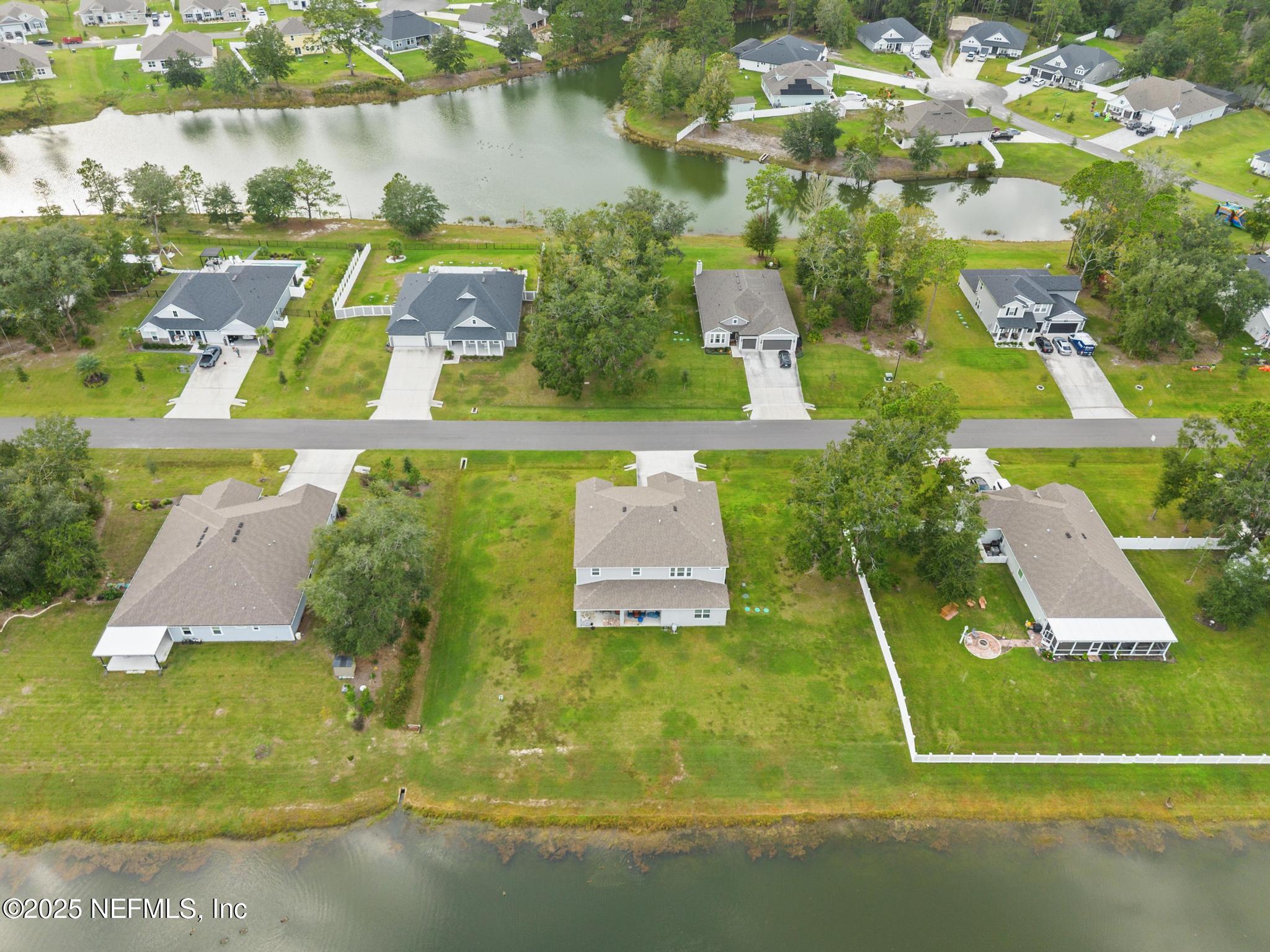 1465 Lake Foxmeadow Road Middleburg, FL 32068 - Photo 41 of 45 an aerial view of a pool