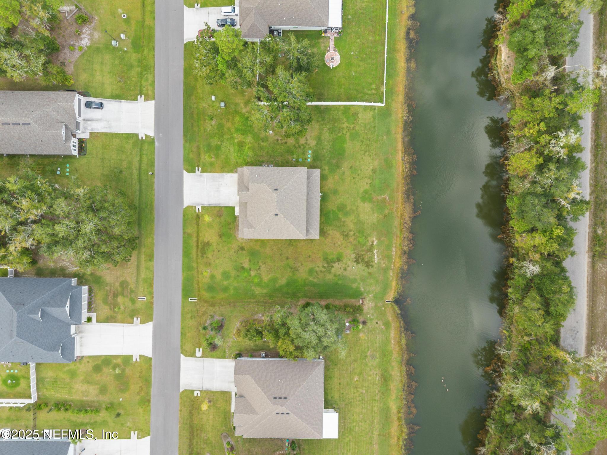 1465 Lake Foxmeadow Road Middleburg, FL 32068 - Photo 44 of 45 aerial view of a garden