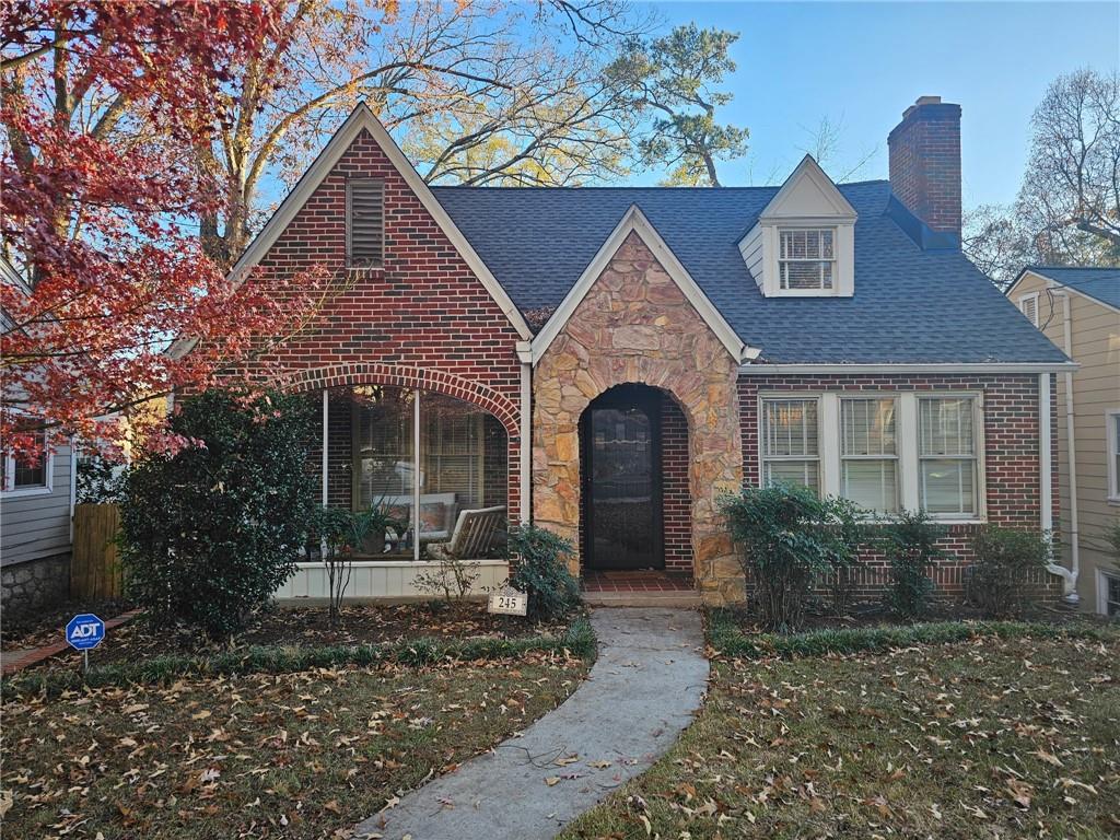 245 Lindbergh Drive Northeast Atlanta, GA 30305 - Photo 1 of 13 a front view of a house with garden