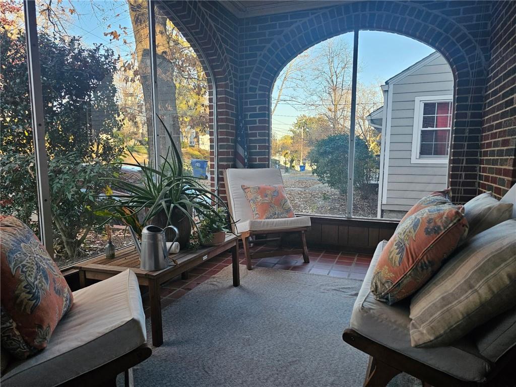 245 Lindbergh Drive Northeast Atlanta, GA 30305 - Photo 11 of 13 a outdoor living space with furniture and a potted plant