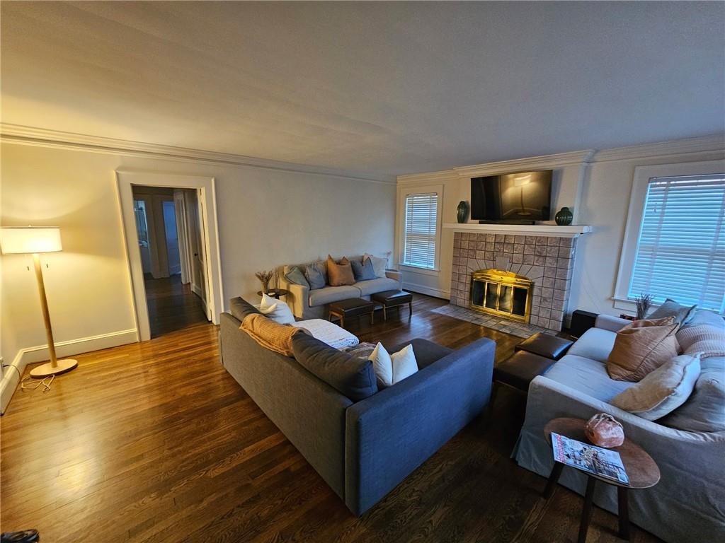 245 Lindbergh Drive Northeast Atlanta, GA 30305 - Photo 4 of 13 a living room with furniture and a fireplace