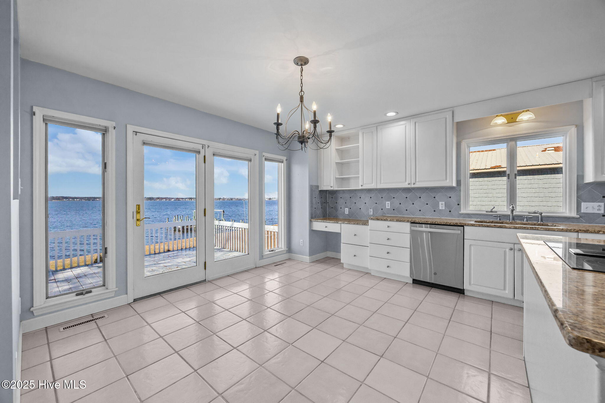 144 River Acres Road Washington, NC 27889 - Photo 24 of 60 Kitchen with dining area and water views