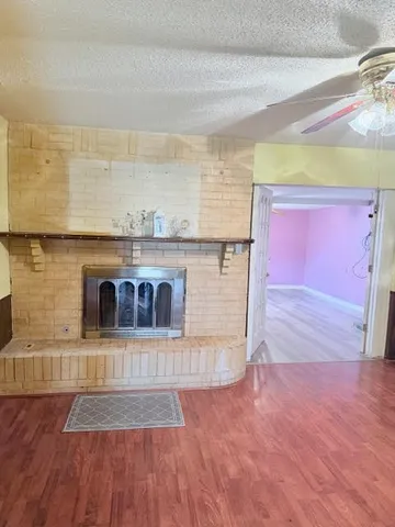 a view of kitchen with stainless steel appliances granite countertop a stove top oven