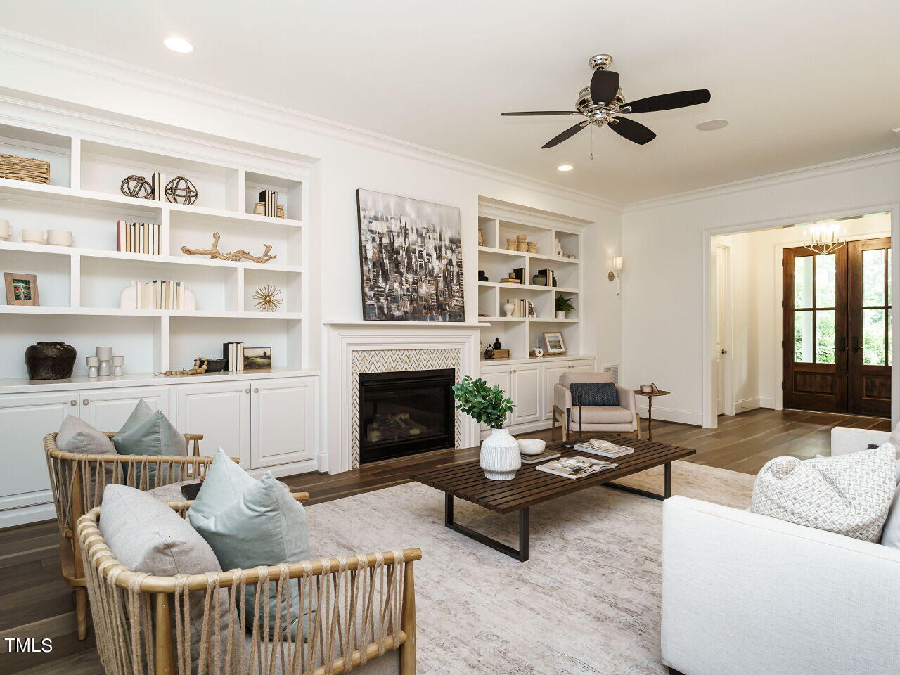 4405 Boxwood Road Raleigh, NC 27612 - Photo 16 of 58 a living room with furniture and a fireplace