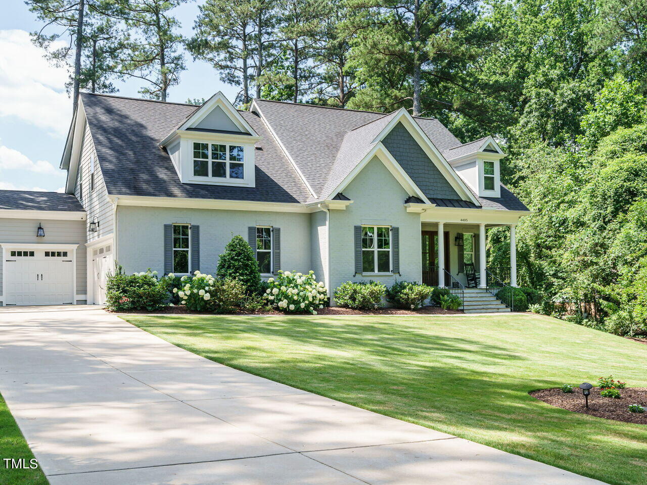 4405 Boxwood Road Raleigh, NC 27612 - Photo 2 of 58 a front view of a house with a yard