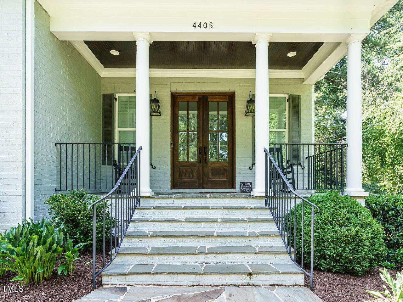 4405 Boxwood Road Raleigh, NC 27612 - Photo 3 of 58 a view of a house with entrance and windows