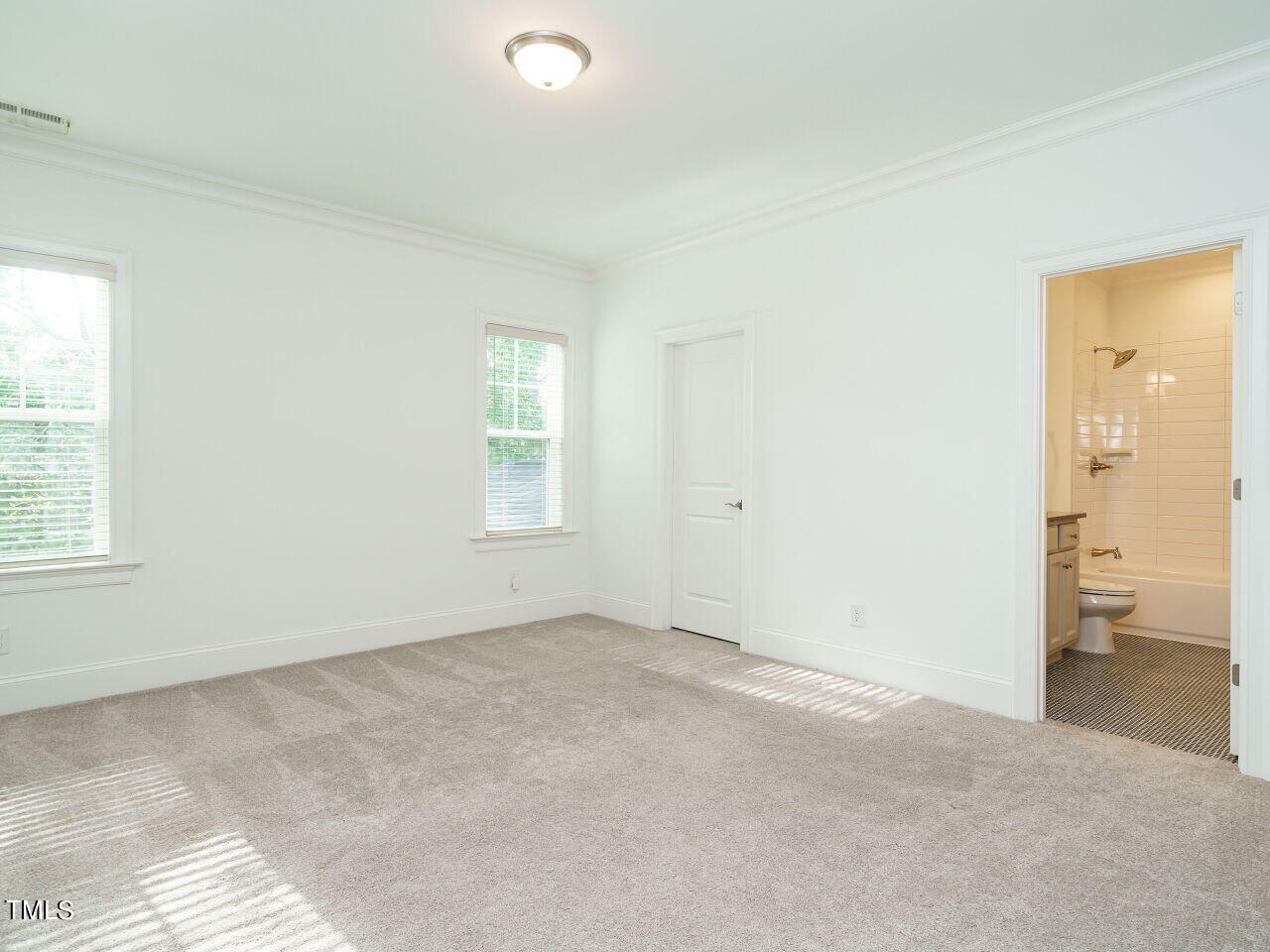 4405 Boxwood Road Raleigh, NC 27612 - Photo 33 of 58 an empty room with a window