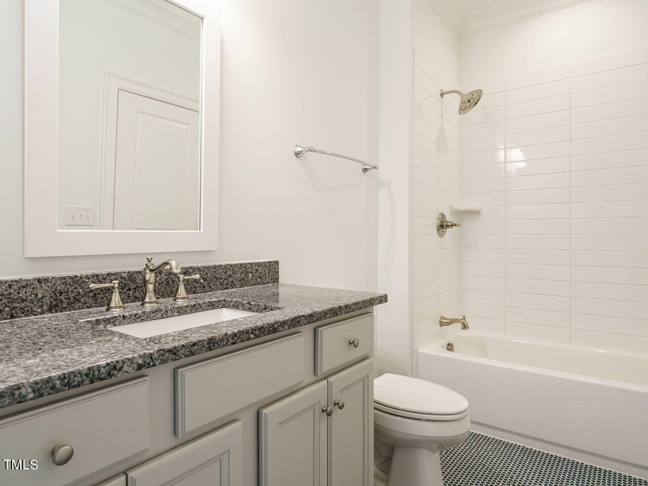 4405 Boxwood Road Raleigh, NC 27612 - Photo 34 of 58 a bathroom with a granite countertop sink toilet and shower