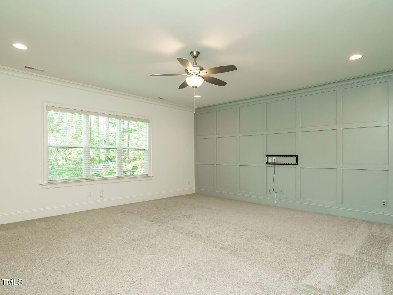 4405 Boxwood Road Raleigh, NC 27612 - Photo 36 of 58 a view of a livingroom with a ceiling fan and window