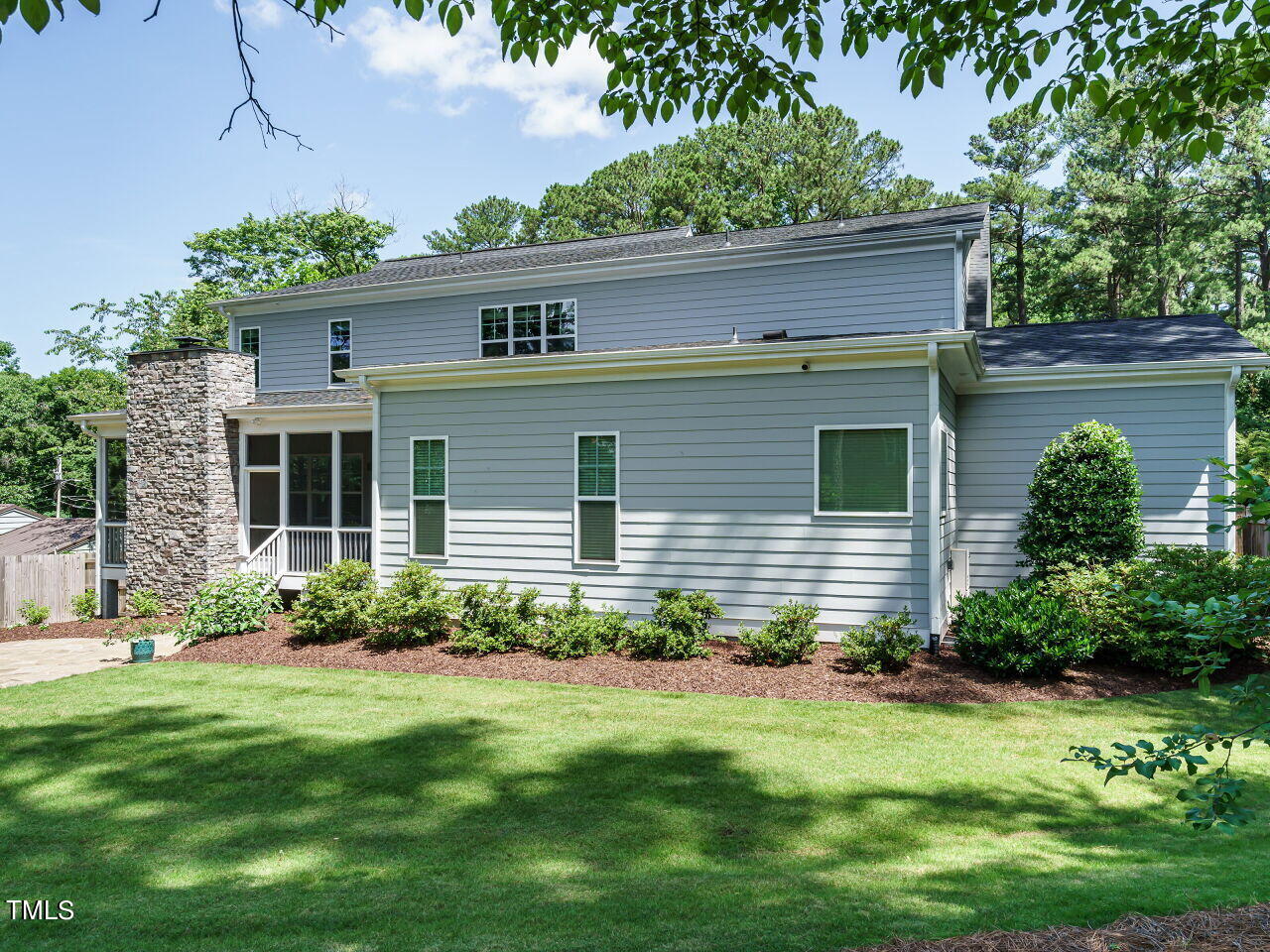 4405 Boxwood Road Raleigh, NC 27612 - Photo 44 of 58 a view of front of house with a yard