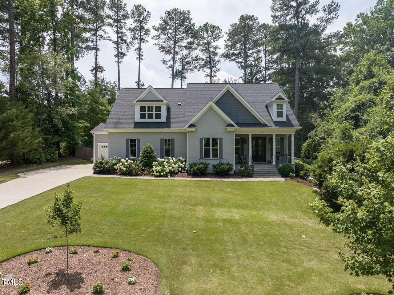 4405 Boxwood Road Raleigh, NC 27612 - Photo 45 of 58 a front view of a house with a yard