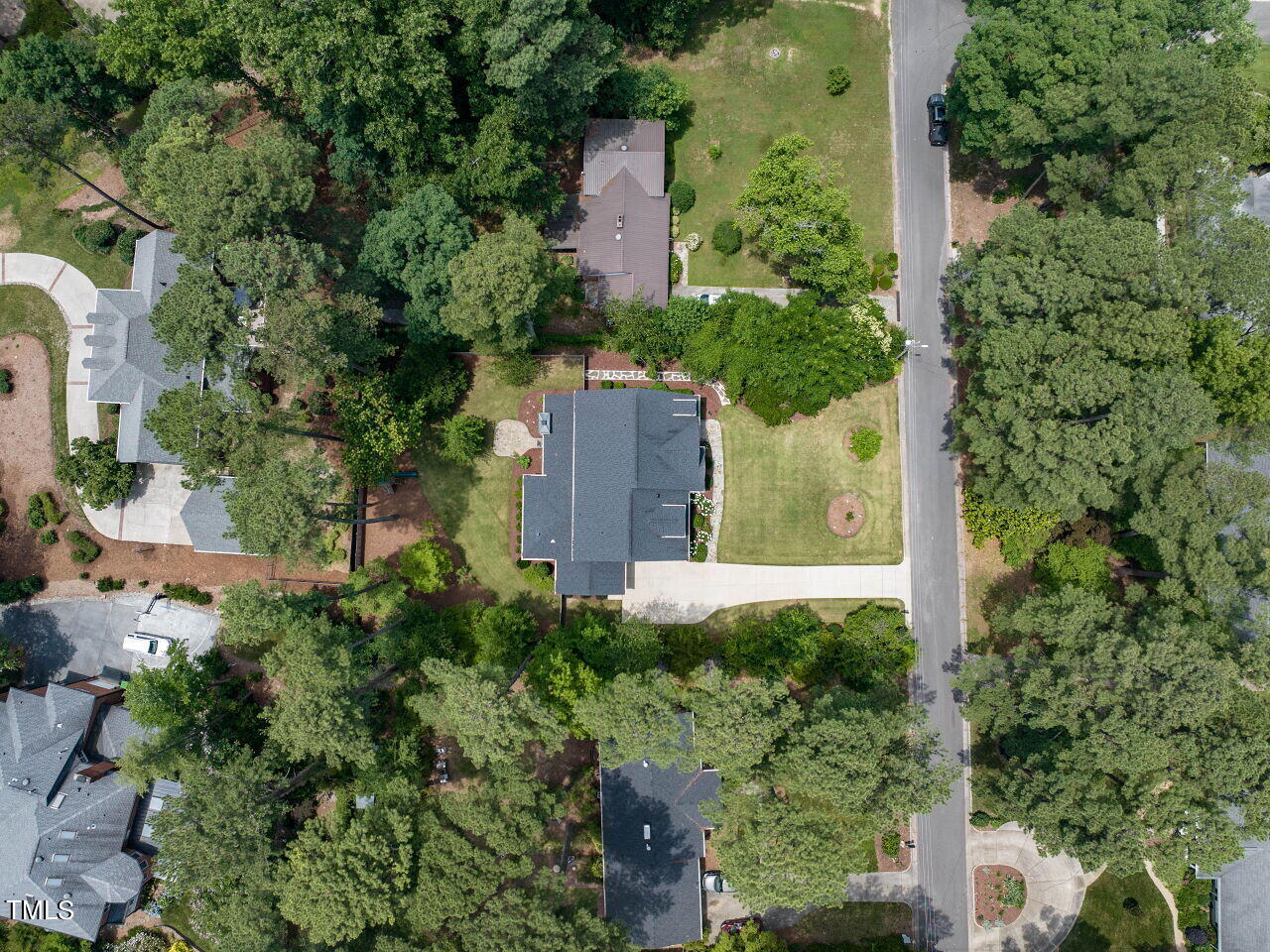 4405 Boxwood Road Raleigh, NC 27612 - Photo 51 of 58 an aerial view of a house with a yard