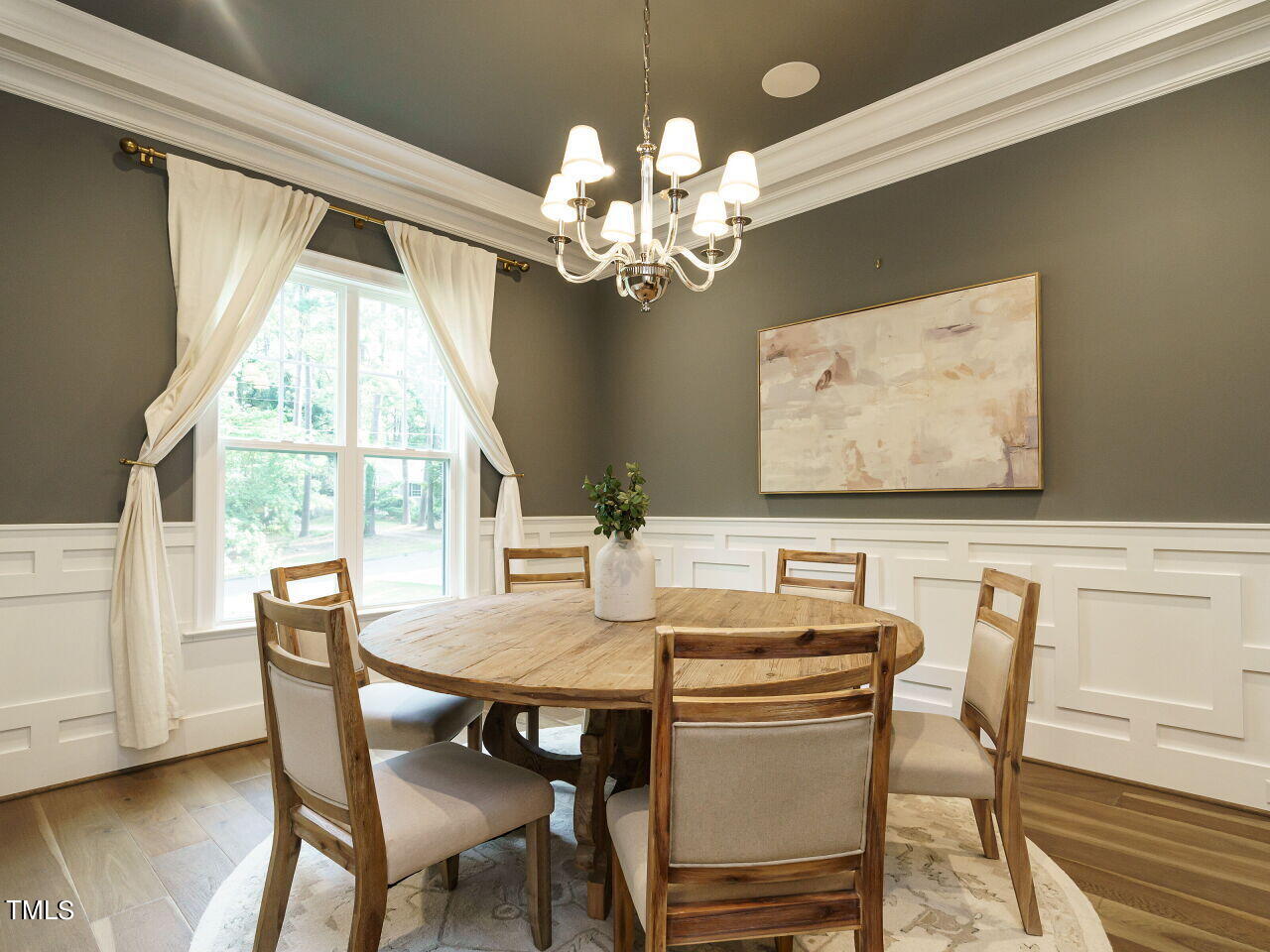 4405 Boxwood Road Raleigh, NC 27612 - Photo 6 of 58 a view of a dining room with furniture window and wooden floor