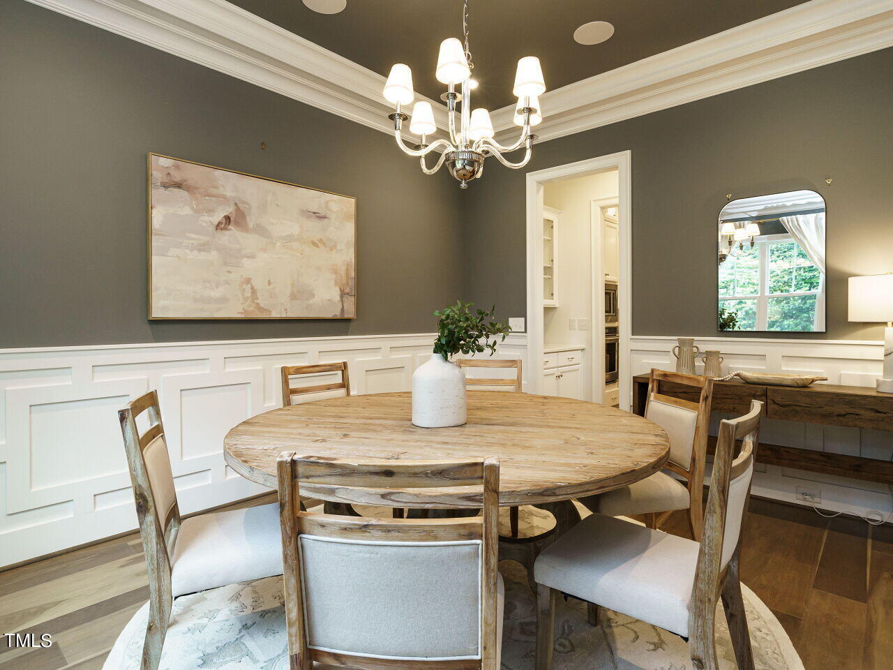 4405 Boxwood Road Raleigh, NC 27612 - Photo 7 of 58 a view of a dining room with furniture and chandelier
