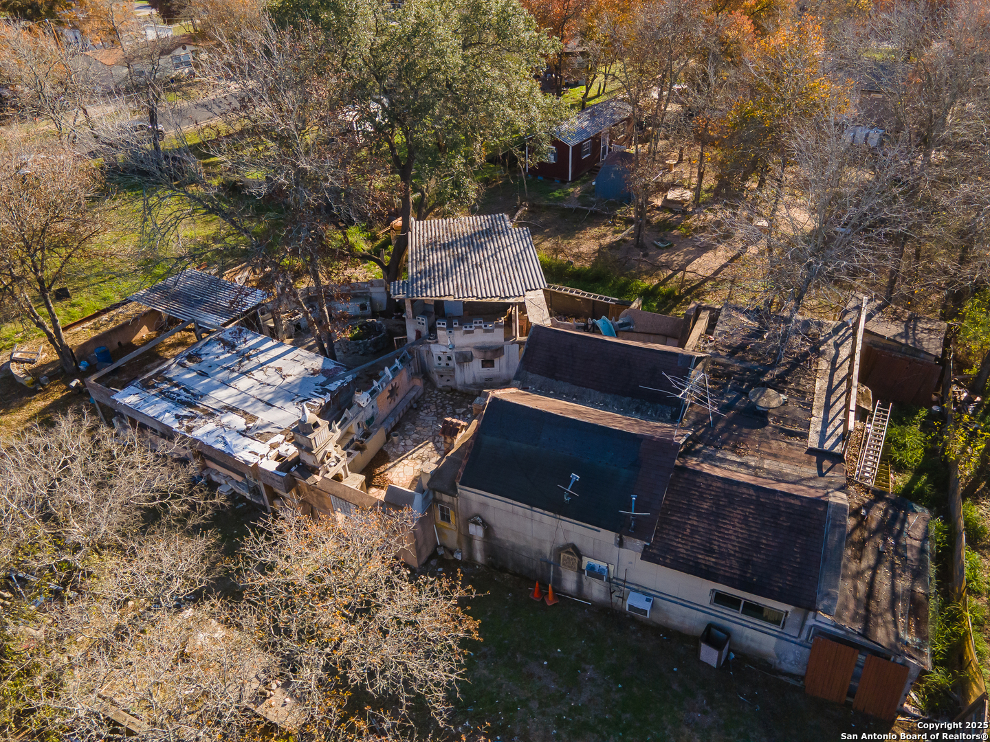 23311 Hickory Shadow Elmendorf, TX 78112 - Photo 3 of 3 an aerial view of a house with a yard